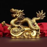 a golden copper dragon statue